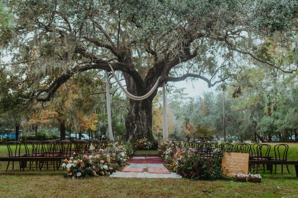 magnolia plantation ceremony setup mossy trees and florals