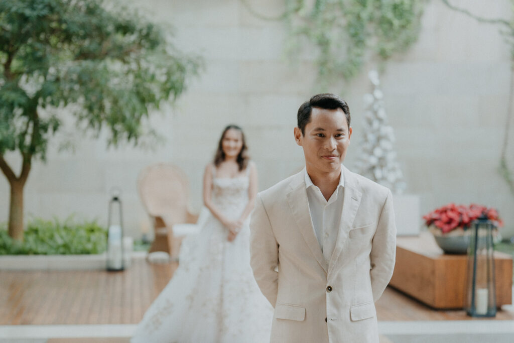 thailand wedding couple waiting for their first look