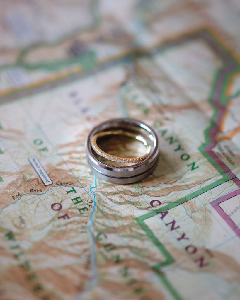 wedding rings on the map from black canyon of the gunnison national park - elopement timeline